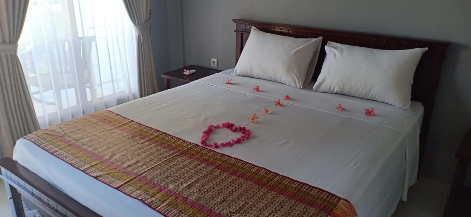Rasti 2 Homestay Kuta  Номер фото